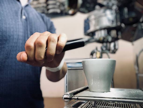 istock Barista is making coffee.  smart watch 1171303806
