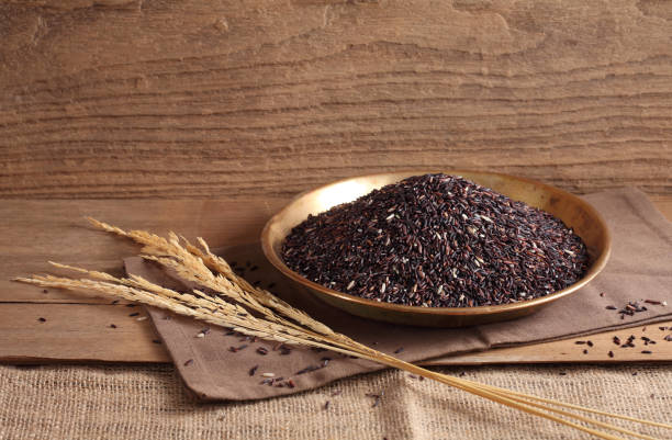 istock rice berry rice in golden tray on table with a blank space for a text 1171305604
