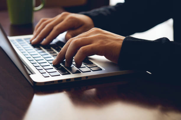 istock Business man using laptop computer. Male hand typing on laptop keyboard 1171307016
