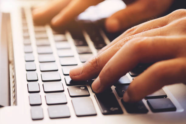 istock Business man using laptop computer. Male hand typing on laptop keyboard 1171307030