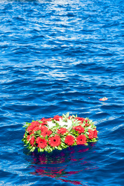 istock Memorial wreaths on the sea 1171307262