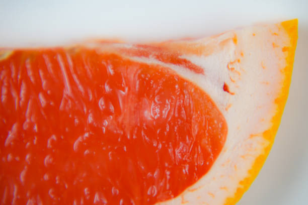 Some peeled pomelo fruit, isolated on white background