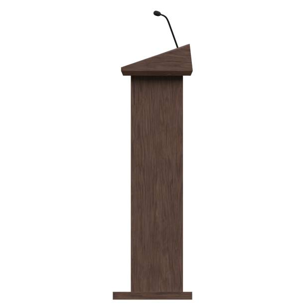 istock Wooden podium with a microphone 1171308688