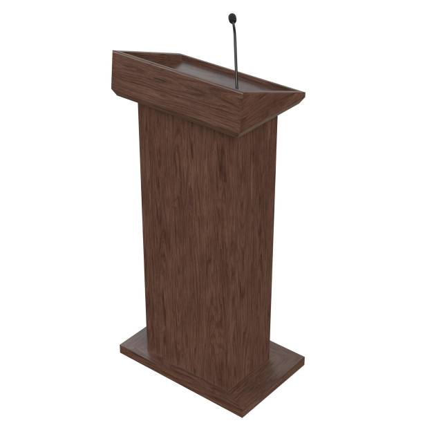 istock Wooden podium with a microphone 1171308707