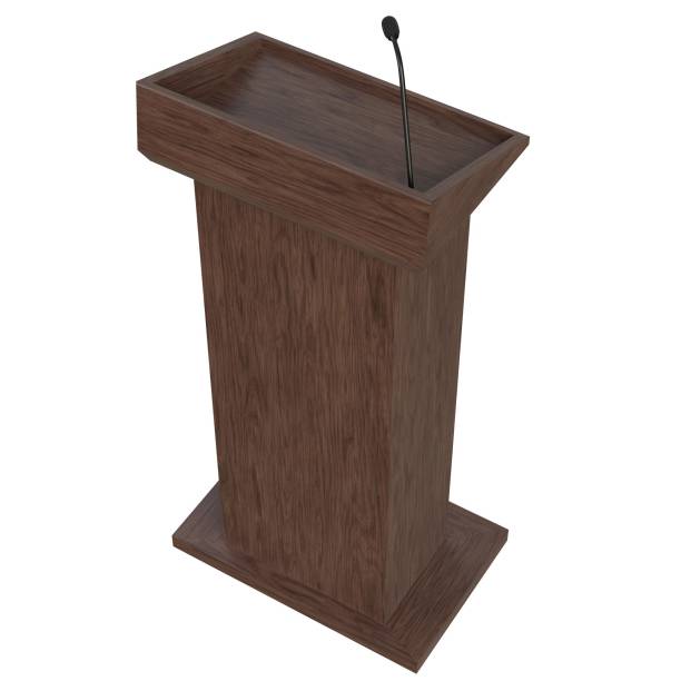 istock Wooden podium with a microphone 1171308749