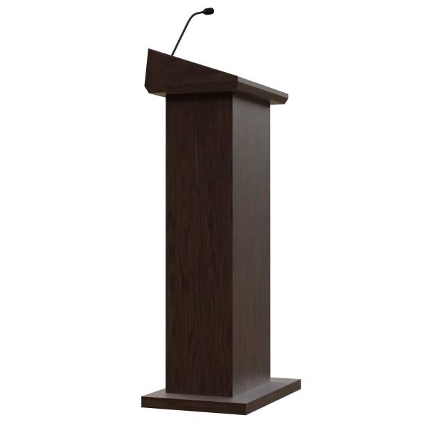 istock Wooden podium with a microphone 1171308803