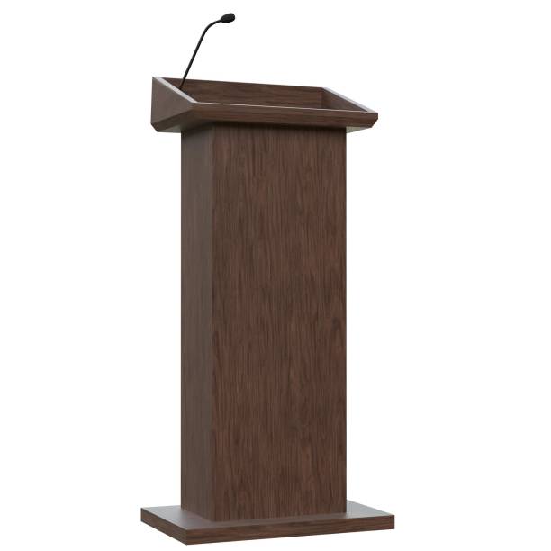 istock Wooden podium with a microphone 1171308807
