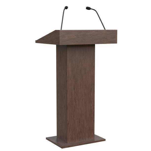 istock Wooden podium with two microphones 1171310039