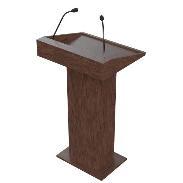 istock Wooden podium with two microphones 1171310061
