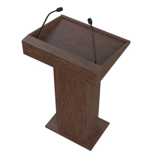 istock Wooden podium with two microphones 1171310092