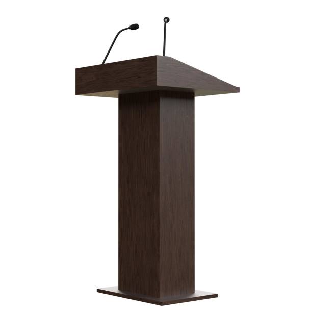istock Wooden podium with two microphones 1171310145