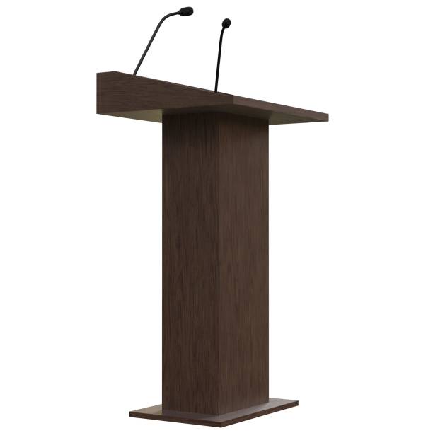 istock Wooden podium with two microphones 1171310165