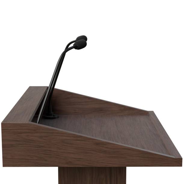 istock Wooden podium with two microphones 1171310170