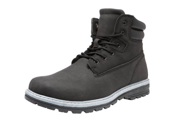 istock black leather boot, winter or autumn shoes, on a white background 1171310910