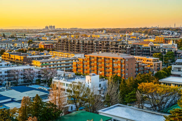 istock Rooftops of Chofu City, which is wrapped in a sunset 1171312209