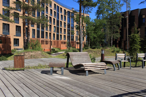 istock wooden boardwalk bench in the foreground 1171316762