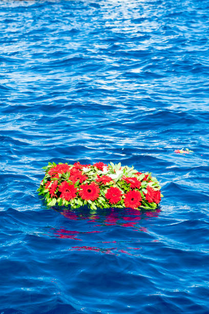 istock Memorial wreaths on the sea 1171320266