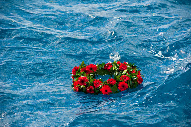 istock Memorial wreaths on the sea 1171323100