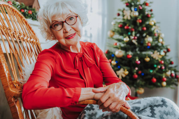 istock Happy mature female is posing at camera 1171326036