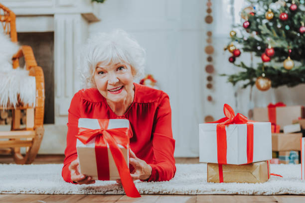 istock Smiling old lady is resting at home 1171326079