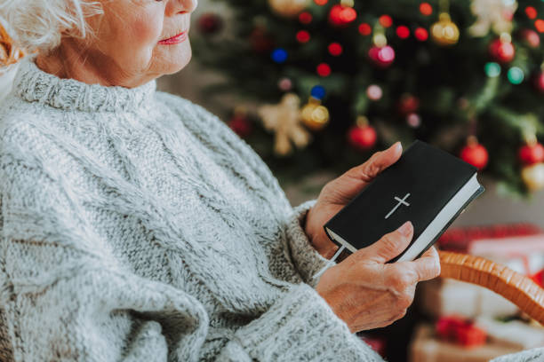 istock Calm senior lady is taking a Bible 1171326121