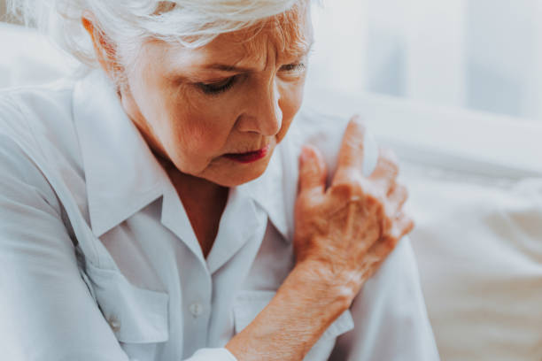 istock Elderly lady holding the shoulder with hand 1171326125