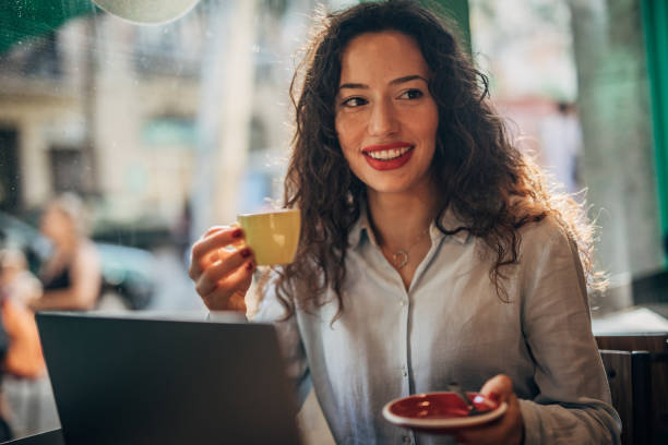 istock Businesswoman Using Laptop In Cafe 1171329110