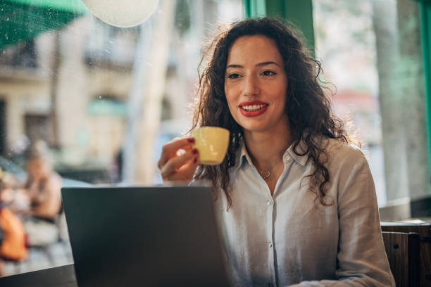 istock Businesswoman Using Laptop In Cafe 1171329230