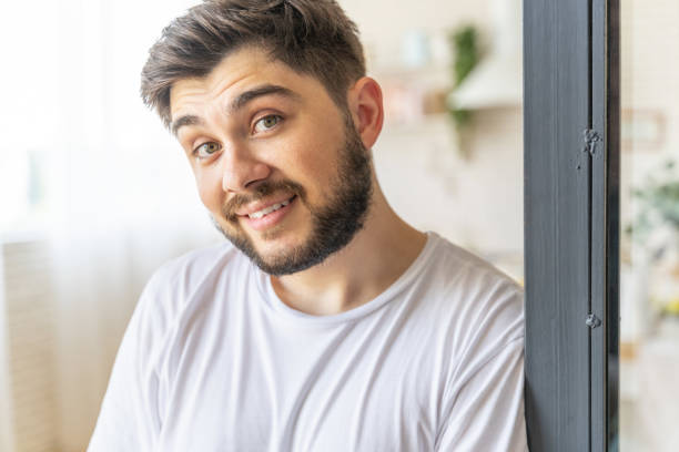istock Cheerful bearded guy is posing at home 1171330396