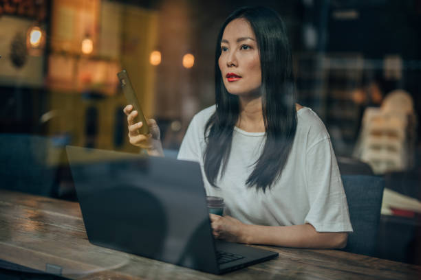 istock Young woman working on laptop in cafe 1171332249