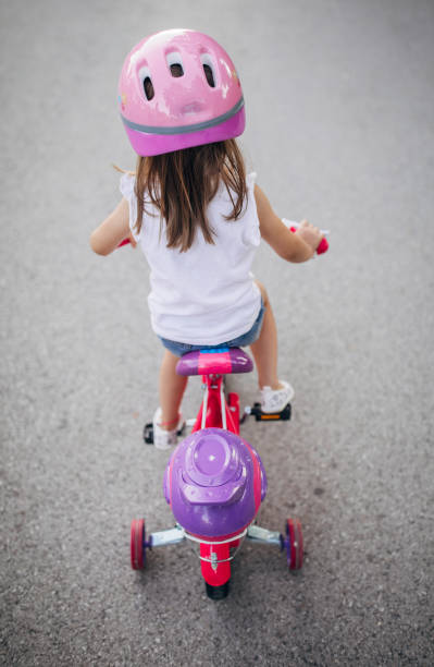 istock Girl learning to drive a bike 1171333124