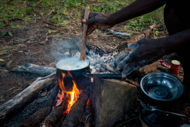 Traditional Nshima cooking in Zamiba stock photo