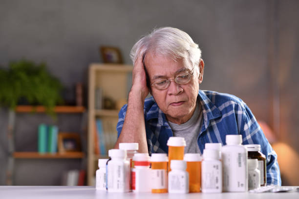 istock Asian senior man  with his medicine bottles 1171336608