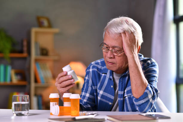 istock Asian senior man  with his medicine bottles 1171336663
