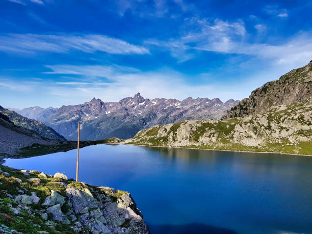 Lake of the sagne and behind the majestic Belledonne and its Grand pic. stock photo