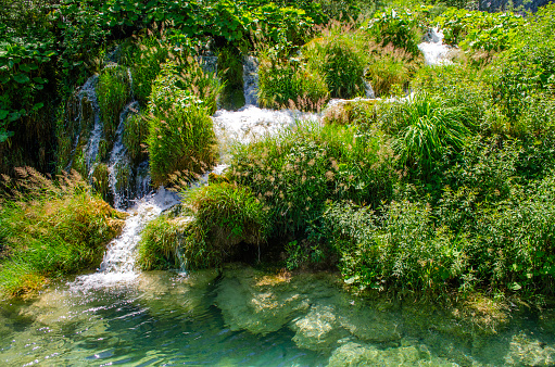 Crystal water of Plitvice Lakes. Landscapes and waterfalls.