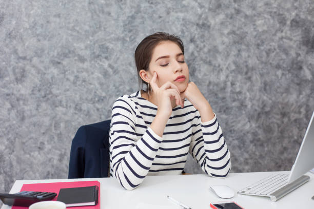 istock Feeling tired. Beautiful Young woman feeling stress from work. 1171338908