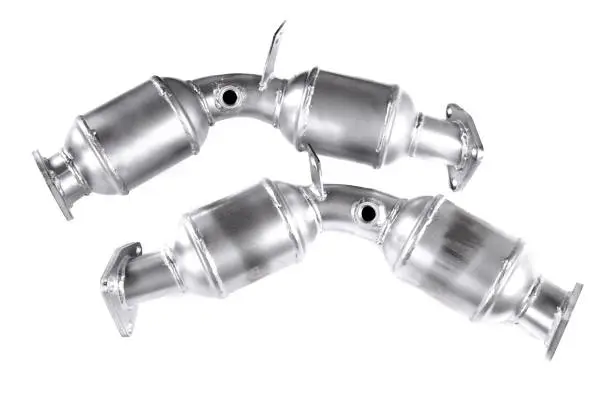Catalytic converters isolated over white background