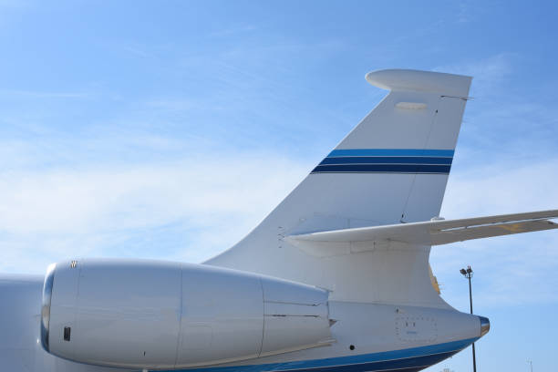 istock Close up of a jet engine and tail of a private jet. 1171340448