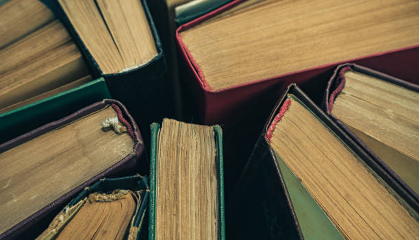 istock Close up Open old  books background. Top view. 1171342072