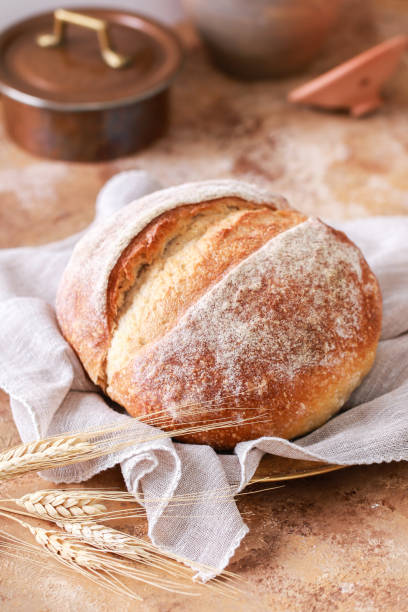 istock Round loaf of freshly backed sourdough bread. 1171344433