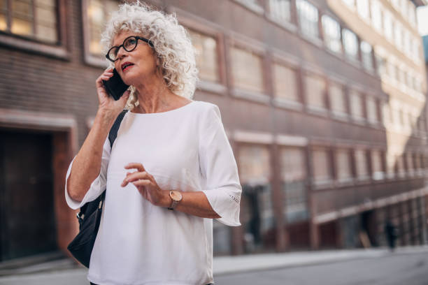 istock Senior woman using phone 1171349028