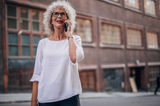 istock Senior woman using phone 1171349117