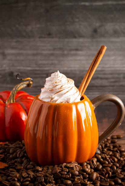 istock Pumpkin Spice Latte on a Rustic Wooden Table 1171350634
