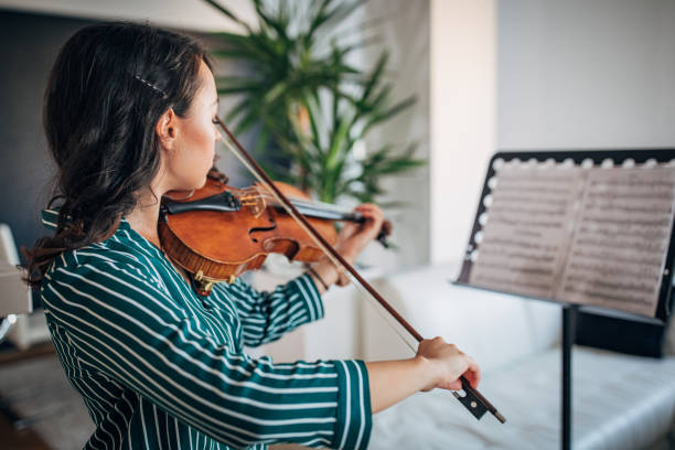 istock Beautiful Violinist Woman 1171353631