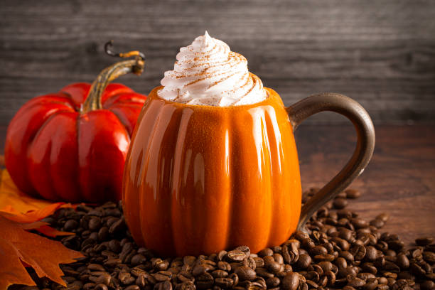 istock Pumpkin Spice Latte on a Rustic Wooden Table 1171354302