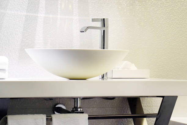 istock Modern white bathroom sink with faucet 1171354553