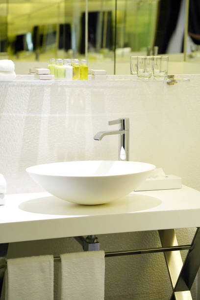 istock Modern white bathroom sink with faucet 1171354704