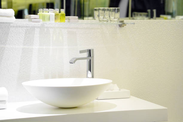 istock Modern white bathroom sink with faucet 1171354706