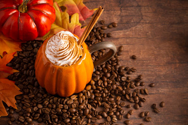 istock Pumpkin Spice Latte on a Rustic Wooden Table 1171354851